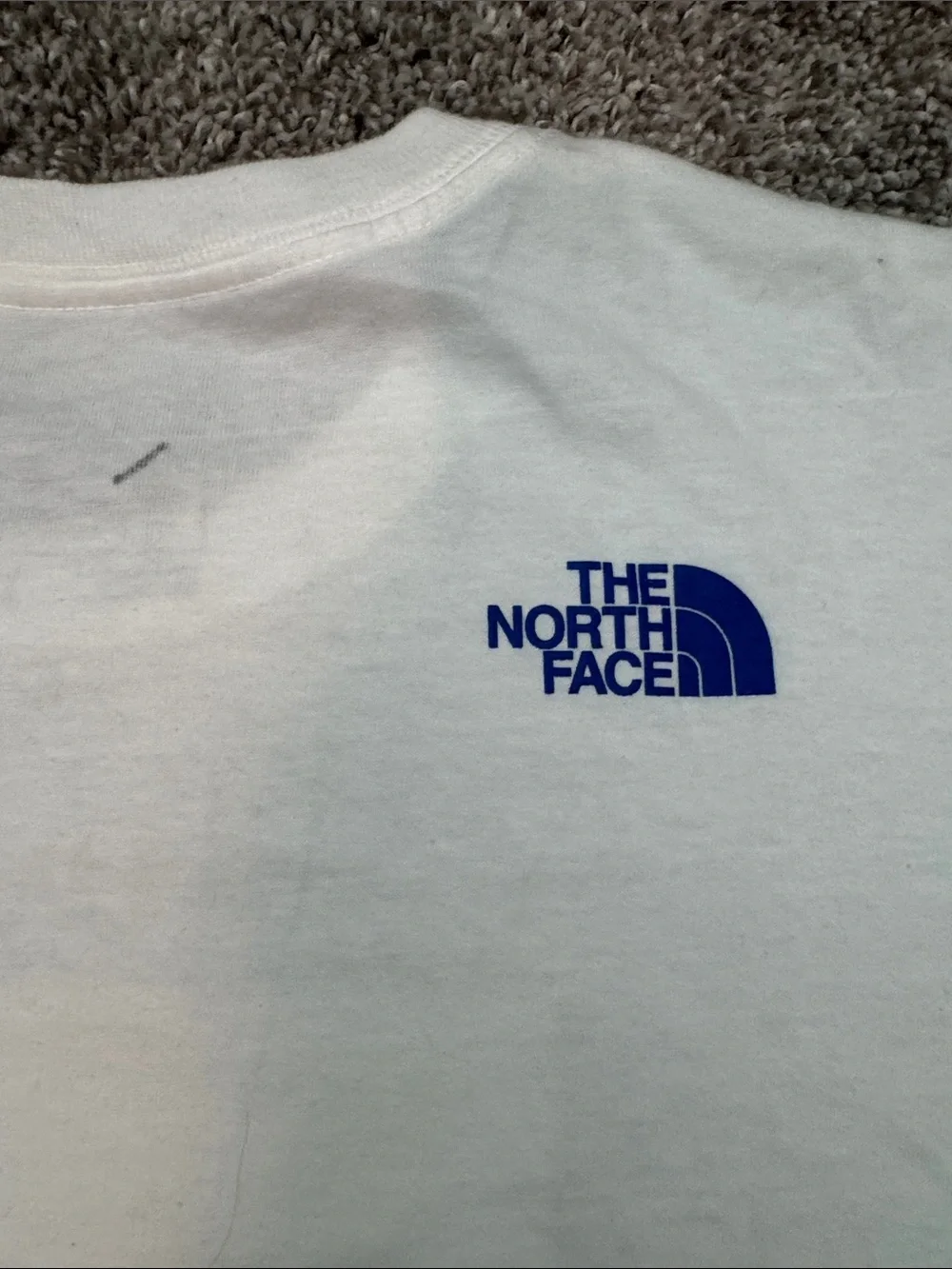 The North Face White Tee with Red & Blue Karakoram Graphic